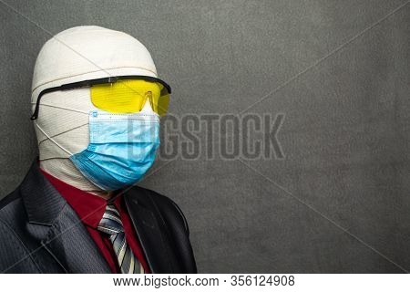 Incognito Man In A Medical Mask Is Dressed In A Business Suit