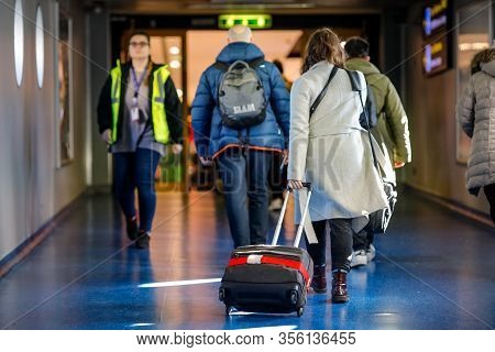 Otopeni, Romania - February 25, 2020: Passengers Inside Henri Coanda International Airport, Near Buc