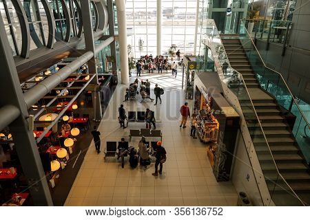 Otopeni, Romania - February 25, 2020: Passengers Inside Henri Coanda International Airport, Near Buc