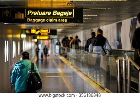 Otopeni, Romania - February 25, 2020: Passengers Inside Henri Coanda International Airport, Near Buc