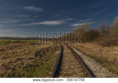 Railway Track Near Kojetice Na Morave Station In Winter Sunny Day