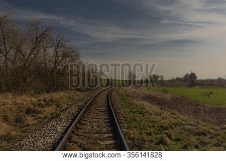 Railway Track Near Kojetice Na Morave Station In Winter Sunny Day
