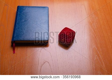 Objects Of Use Of The Office Worker. The Daily Log Of The Businessman On A Table. Workplace Of The M