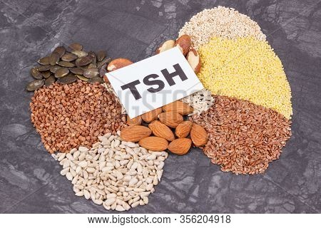 Inscription Tsh And Thyroid Shape Made Of Healthy Ingredients. Source Natural Vitamins And Minerals
