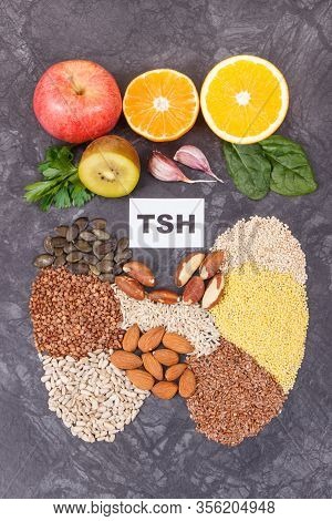 Inscription Tsh And Thyroid Shape Made Of Healthy Ingredients. Source Natural Vitamins And Minerals