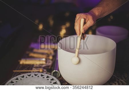 The Hands Of A Person Playing A Musical Instrument