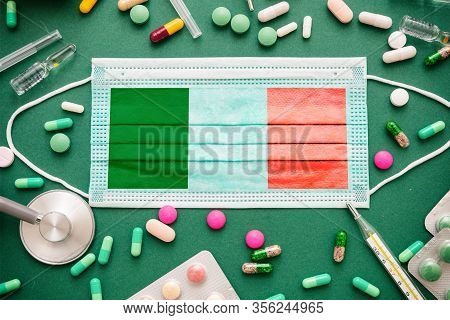 Coronavirus In Italy, Covid-19 Disease Prevention Flatlay With Protective Medical Italian Flag Mask 
