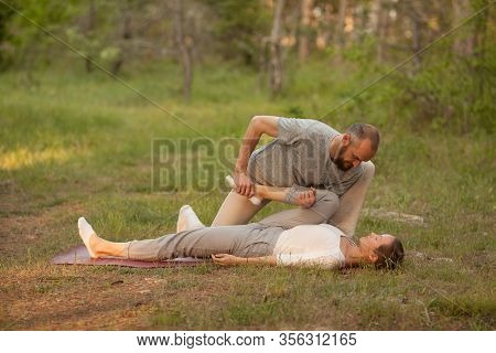 Yumeiho Massage Therapy. Masseur Young Man Doing Oriental Japanese Massage Yumeiho Girl. Concept Of 