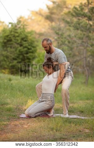 Yumeiho Massage. Masseur Young Man Doing Oriental Japanese Massage Yumeiho Girl. Concept Of Health, 