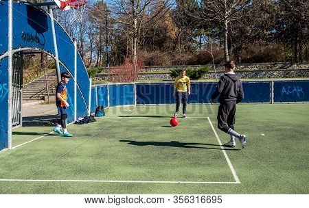 Buchares/romania - 03.17.2020: Young Men Playing Soccer On A Synthetic Field In In Alexandru Ioan Cu