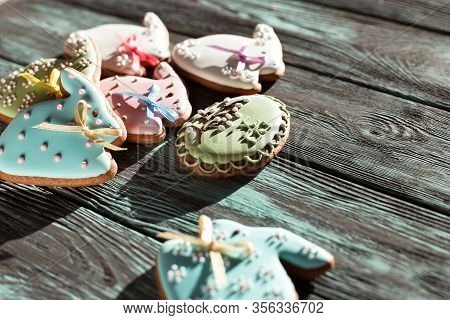 Easter Gingerbread Cookies Decorated  On A Wooden Background