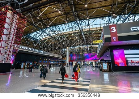 Moscow, Russia - 2020: Sheremetyevo International Airport, People Go To The Check-in Counter. Modern
