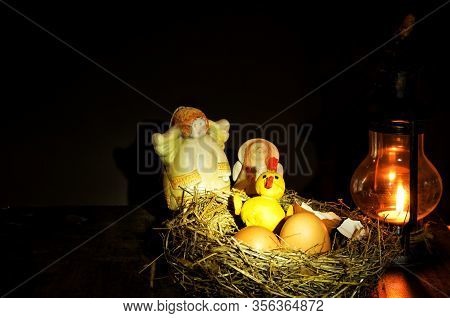 At Night, By The Light Of A Lantern, In A Straw Nest, Surrounded By An Angel, A Chicken Hatched From