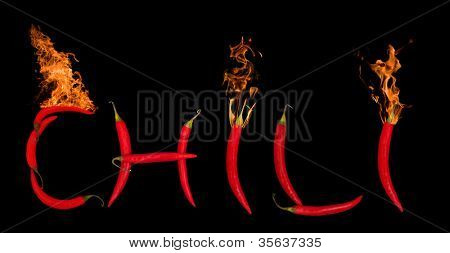 red chili peppers isolated on black backgrpund
