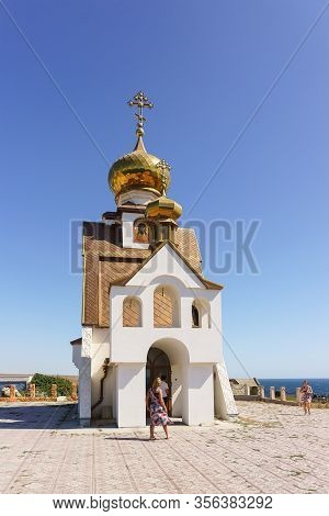Tarkhankut, Crimea, Russia-september 11, 2019: People Inspect The Church-chapel Of St. Nicholas, The