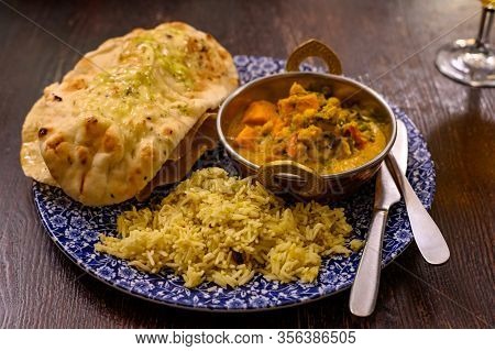 Mangalorean Style Roasted Cauliflower And Spinach Curry With Basmati Rice And Garlic Naan Bread, Tas
