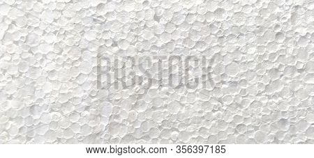 Polyfoam Close-up. White Synthetic Chemical, Building, Insulating And Packaging Material. Pores, Rou