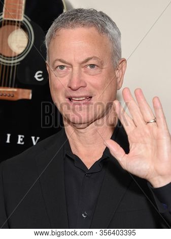 LOS ANGELES - MAR 07:  Gary Sinise arrives for ÃI Still BelieveÃ Screening on March 07, 2020 in Hollywood, CA                