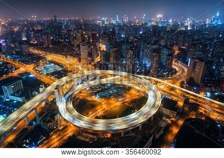 Shanghai Nanpu Bridge over Huangpu River with busy traffic in China.
