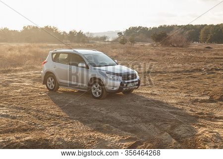 Dnipro, Ukraine - February 19, 2020: Toyota Rav4 2006 Gray Color Among The Sand Near The Forest, Ope