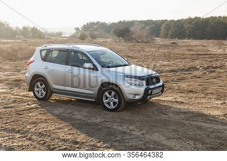 Dnipro, Ukraine - February 19, 2020: Toyota Rav4 2006 Gray Color Among The Sand Near The Forest, Ope