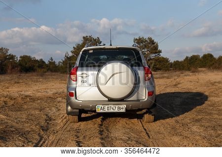 Dnipro, Ukraine - February 19, 2020: Toyota Rav4 2006 Gray Color Among The Sand Near The Forest, Ope