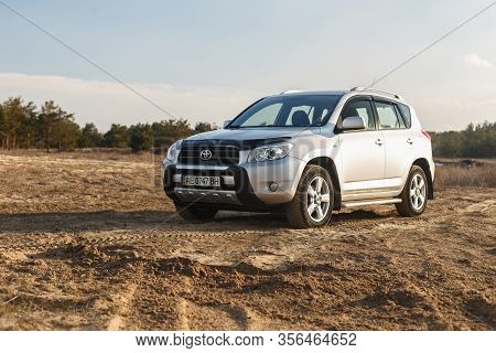 Dnipro, Ukraine - February 19, 2020: Toyota Rav4 2006 Gray Color Among The Sand Near The Forest, Ope