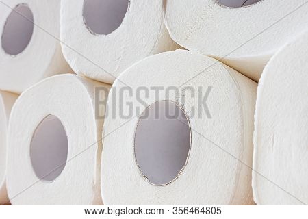 Rolls Of White Toilet Paper Close-up. The Concept Of Personal Hygiene, Sanitation.