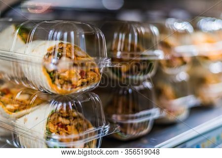 Pre-packaged Sandwiches Displayed In A Commercial Refrigerator