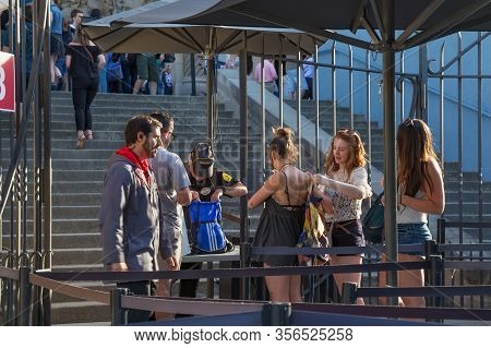 Barcelona, Spain - May 15, 2017: Security Guard Checks Bags At The Entrance To The Sagrada Familia F