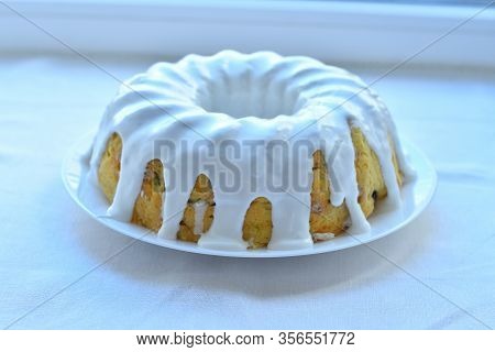 Sweet Easter Cakes With Colorful Eggs Isolated On White Table. Spring Greeting Card. Selrctive Focus