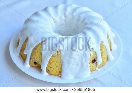Sweet Easter Cakes With Colorful Eggs Isolated On White Table. Spring Greeting Card. Selrctive Focus