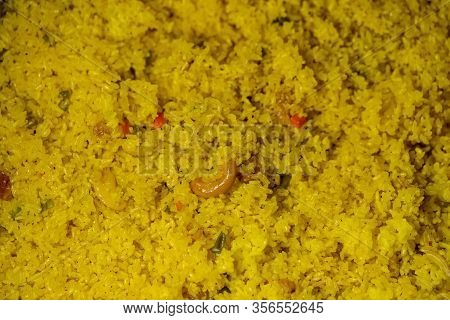 Delicious Authentic Bengali Spicy Yellow Pulao Cooked At A Huge Amount For Indian Wedding. Concept F