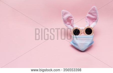 Easter Bunny In Protective Medical Masks Quarantine Concept For Easter Holiday Due To Epidemic. East
