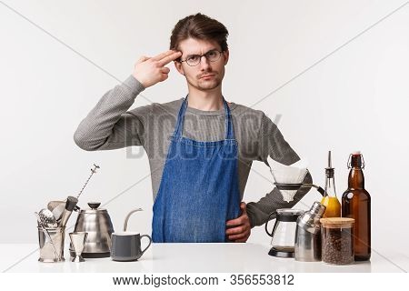 Barista, Cafe Worker And Bartender Concept. Employee Annoyed With Client Strange Bad Taste In Coffee
