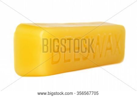 Beeswax On A White Background.beeswax Block. Natural Beeswax.