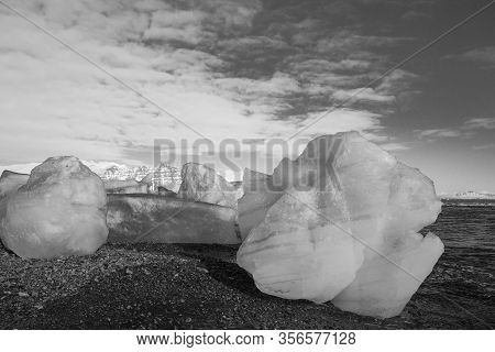 Ice Fields At The Black Pebble Beach, Coast Of Iceland