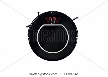 Automatic Robot Vacuum Cleaner In Black Isolated On A White Background. New Modern Technologies For 