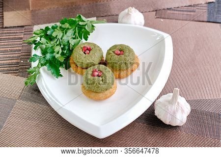 Green Bean Pkhali On Corn Tortilla Mchadi On A White Plate, A Traditional Georgian Dish Of Vegetable