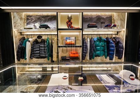 SINGAPORE - APRIL 21, 2019: clothes on display at Moncler store in Singapore Changi Airport. Moncler S.p.A is an apparel brand mostly known for its skiwear.
