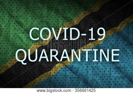 Tanzania Flag And Covid-19 Quarantine Inscription. Coronavirus Or 2019-ncov Virus