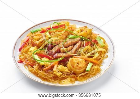 Singapore Mei Fun In Plate Isolated On White Background. Singapore Noodles Is Chinese Cuisine Dish W