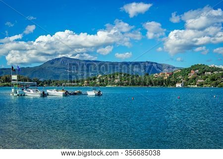 Corfu Island/greece- May 5, 2019: View Of Beautiful Marina - Calm Sea, White Boats For Rent And Blue