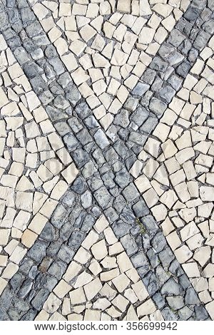 Closeup Surface Of The Blocky Pattern Old Stone Pavement