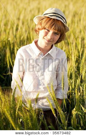 Boy Wearing A Hat Stands