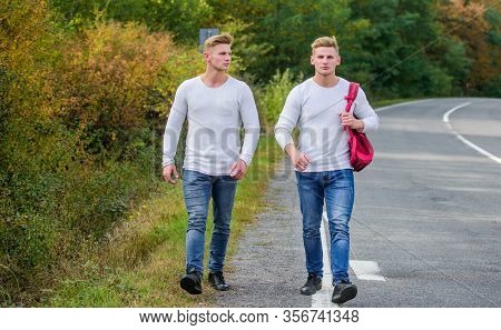 Guys Hitchhiking On Road. Tourist Traveler Travel Auto Stop. Transporting Issues. Pick Spot Where Ca