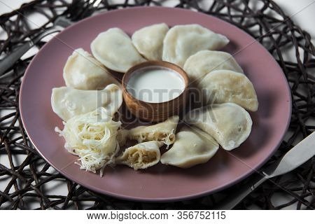 Dumplings With Stewed Cabbage, Homemade Traditional Ukrainian Dish Varenyky
