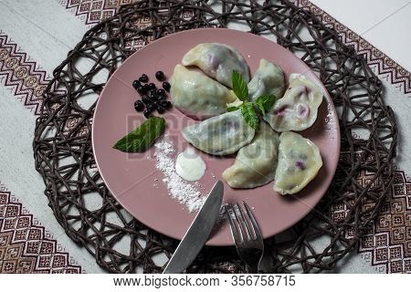 Dumplings With Bilberry, Homemade Traditional Ukrainian Dish Varenyky