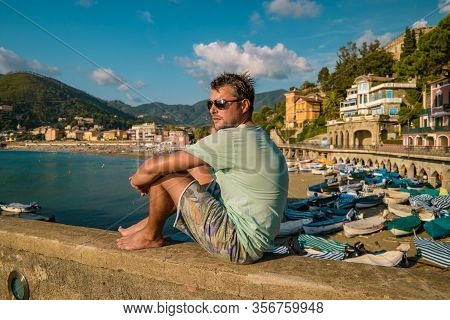 Levanto Cinque Terre Colorful Villag Italy, Colorful Beach With Umbrella During Summer Holiday