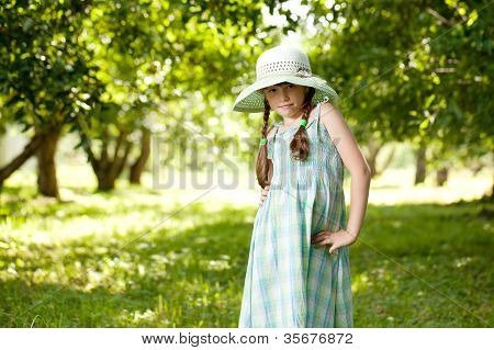 Girl In The Hat And Dress